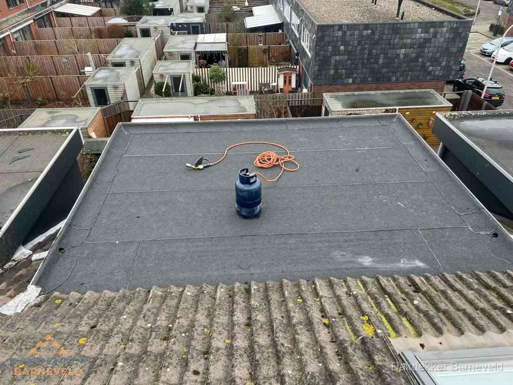 Dakreparatie plat dak met bitumen in Barneveld