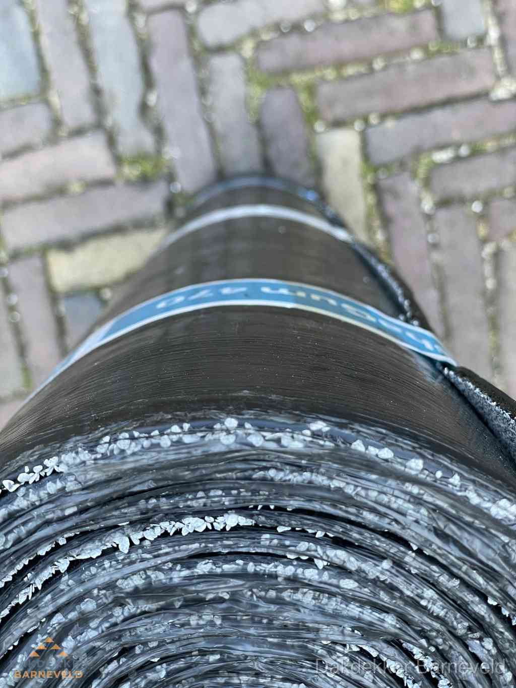 Rol bitumen dakleer met leislag voor plat dak in Barneveld
